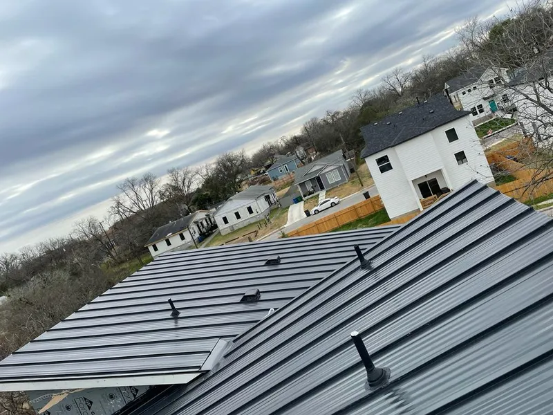 Standing seam metal roof panels with vents for Skylight Repair in Orchard Mesa